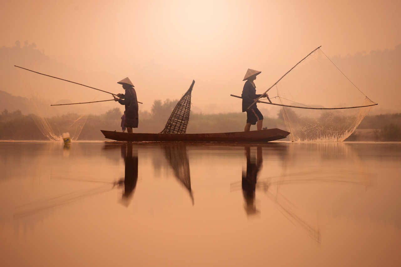 Pêcheurs traditionnels sur le Mékong au Vietnam