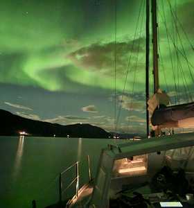 Voyage en bateau sous les aurores boréales en Norvège