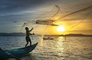 Pêcheur dans la lagune de Tam Giang