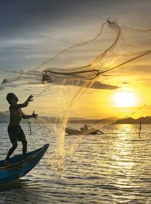 Pêcheur dans la lagune de Tam Giang